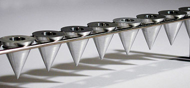 Cone Menorah (Steel) by Laura Cowan